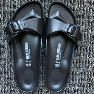 One strap black Birkenstock’s